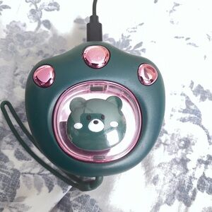 Green and Pink Bear-Themed paw hand warmer